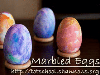 Make marbled Easter egg designs with shaving cream. | The Dating Divas