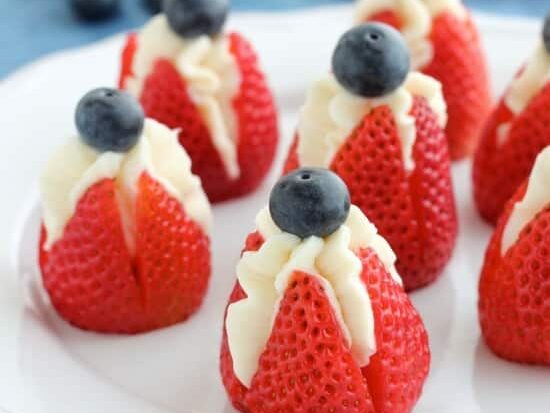 Cream-filled strawberries make delicious 4th of July desserts. | The Dating Divas