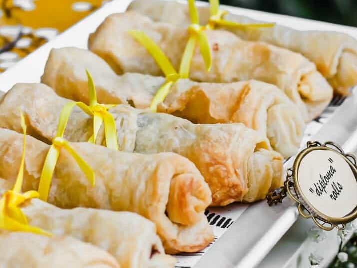 Try adding these tasty diploma pastry rolls to your list of graduation party ideas | The Dating Divas