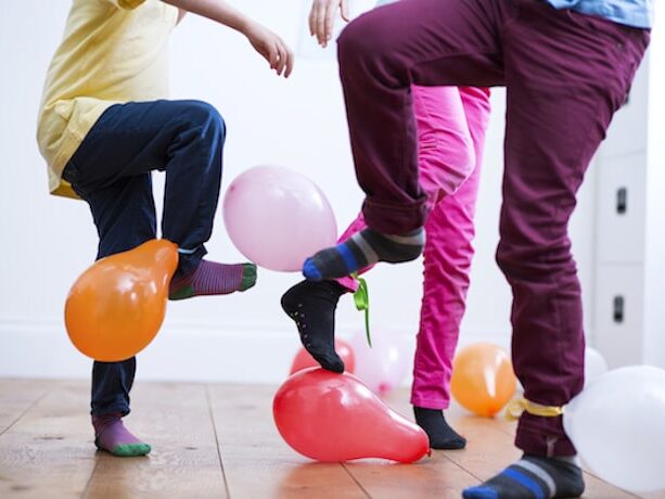 Balloon stomping may be one of the loudest family reunion ideas, but it sure is fun! | The Dating Divas