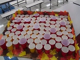 Ping pong toss set up at a family gathering. | The Dating Divas