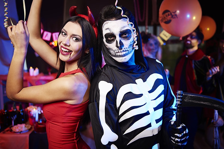 Halloween songs inspire a festive couple to dance. | The Dating Divas