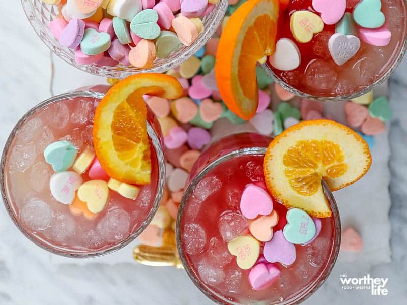 Cute and colorful Be Mine mocktails made with candy hearts for Valentine's Day | The Dating Divas