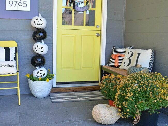 Make Halloween decor by painting plastic pumpkins. | The Dating Divas