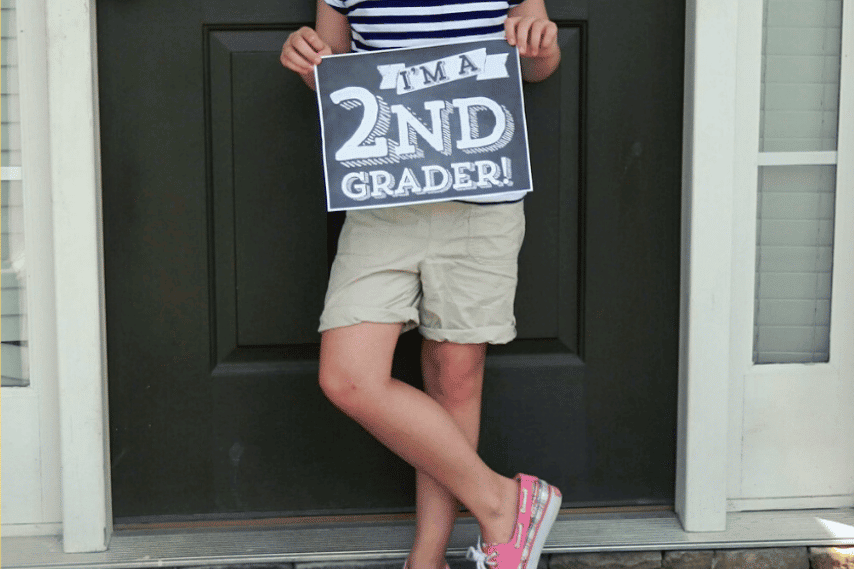 A first day of school sign that can be used in photos | The Dating Divas