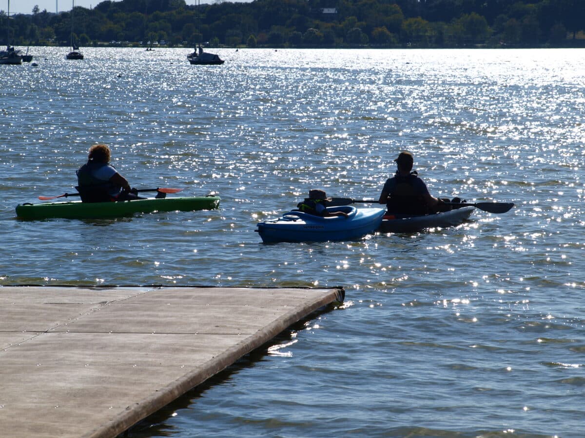 Enjoy a kayak ride along White Rock Lake for fun things to do in Dallas | The Dating Divas