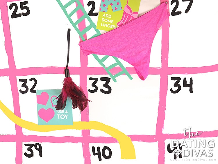 DIY bedroom bedsheet game of Chutes and Ladders for an epic sexy foreplay game night | The Dating Divas