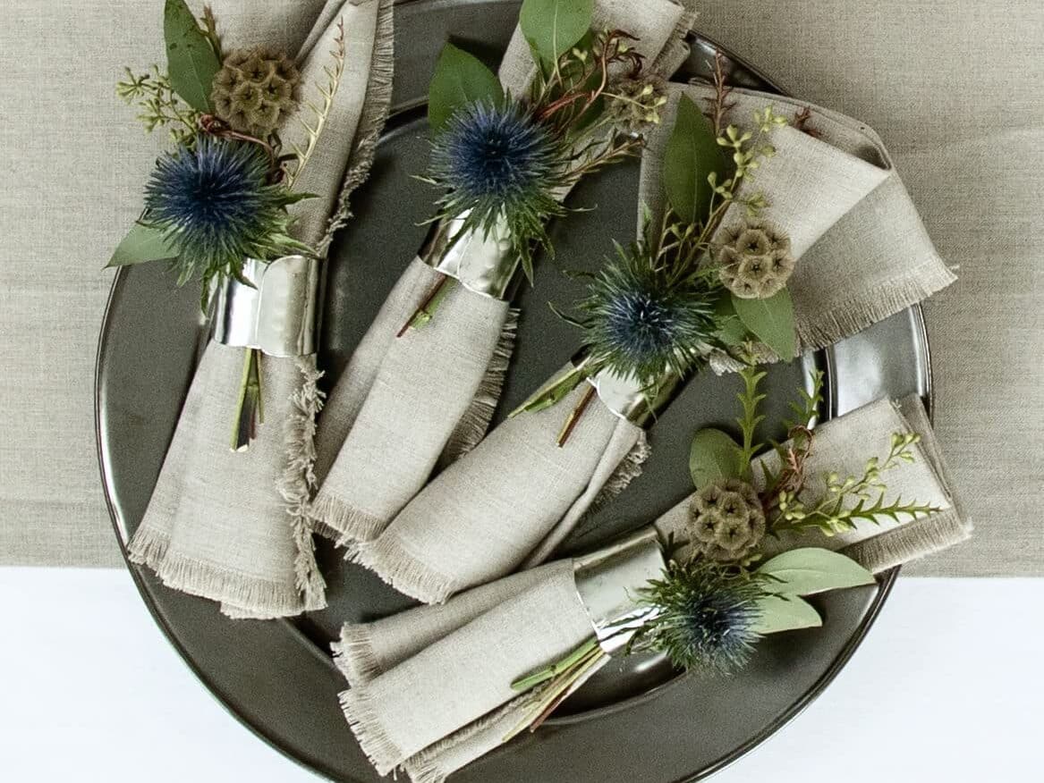 Classic neutral cloth linen napkins to use as Thanksgiving table decor ideas | The Dating Divas