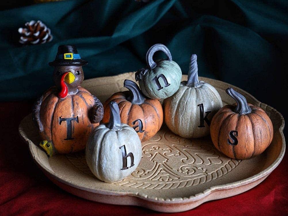 Mini rustic engraved turkey pumpkins to use as Thanksgiving table decor | The Dating Divas