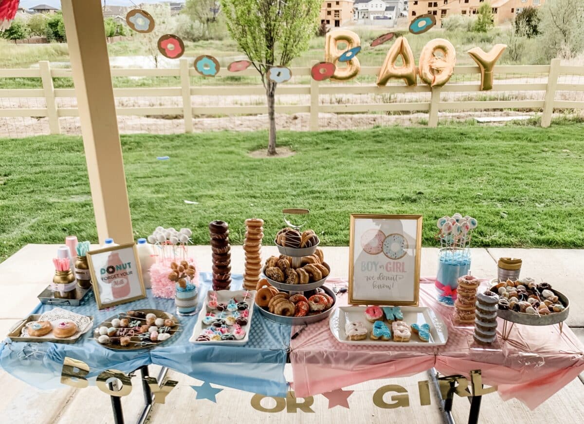 Donuts are the perfect treat to serve at a gender reveal party! | The Dating Divas