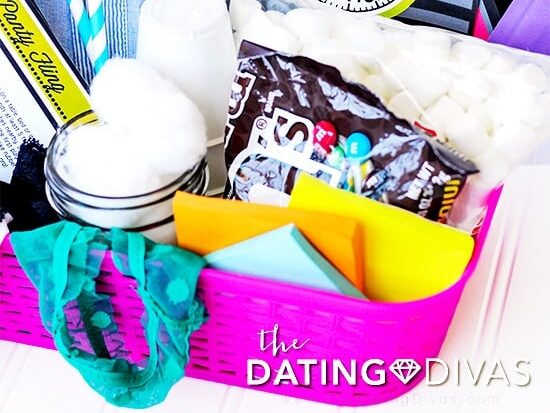 Basket full of goodies for a sexy foreplay game of Win It In a Minute with free printables | The Dating Divas