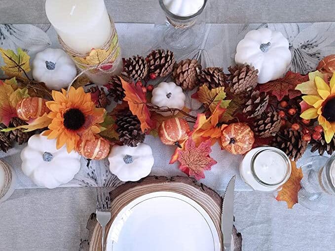 Mini white pumpkins displayed as Thanksgiving table decor for a modern and chic look | The Dating Divas
