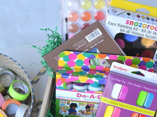 Christmas gift baskets full of clay and paint for children. | The Dating Divas