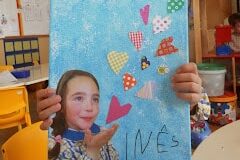 Blow a Kiss Grandparent's Day craft with grandchild and hearts on canvas. | The Dating Divas
