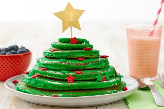 Your kiddos will adore these pancakes shaped like Christmas trees for Christmas morning breakfast! | The Dating Divas