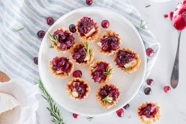 Apple cranberry brie bites are a perfect Christmas food for your next holiday party! | The Dating Divas