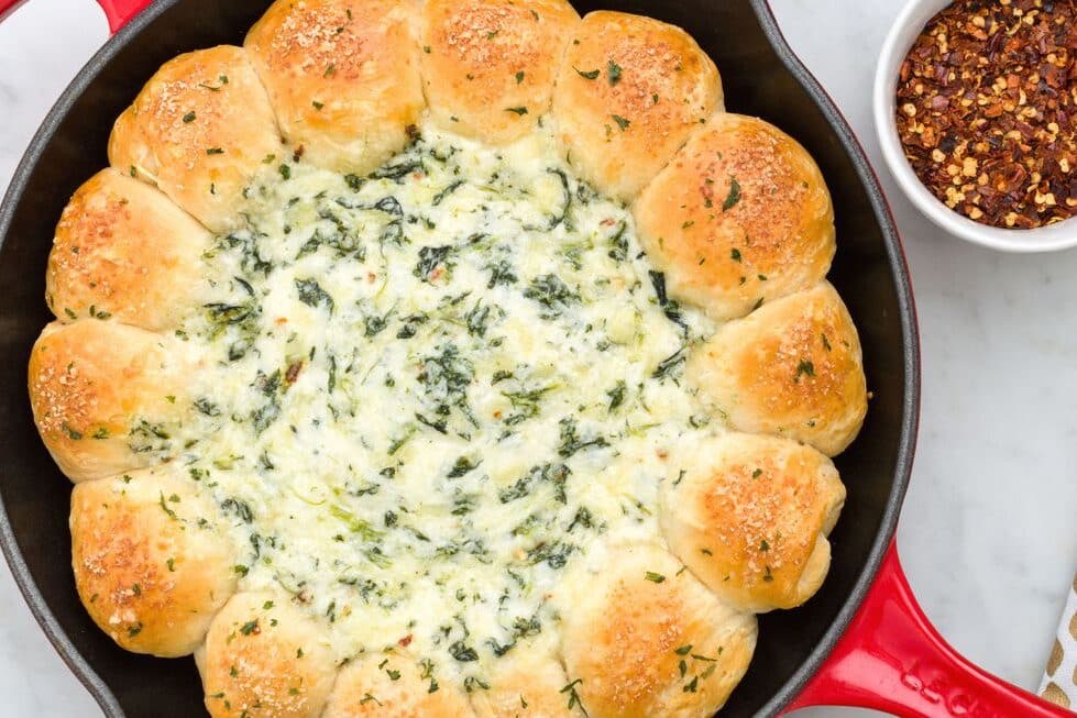 Your guests will love this Christmas dinner recipe: baked biscuit wreath dip! | The Dating Divas