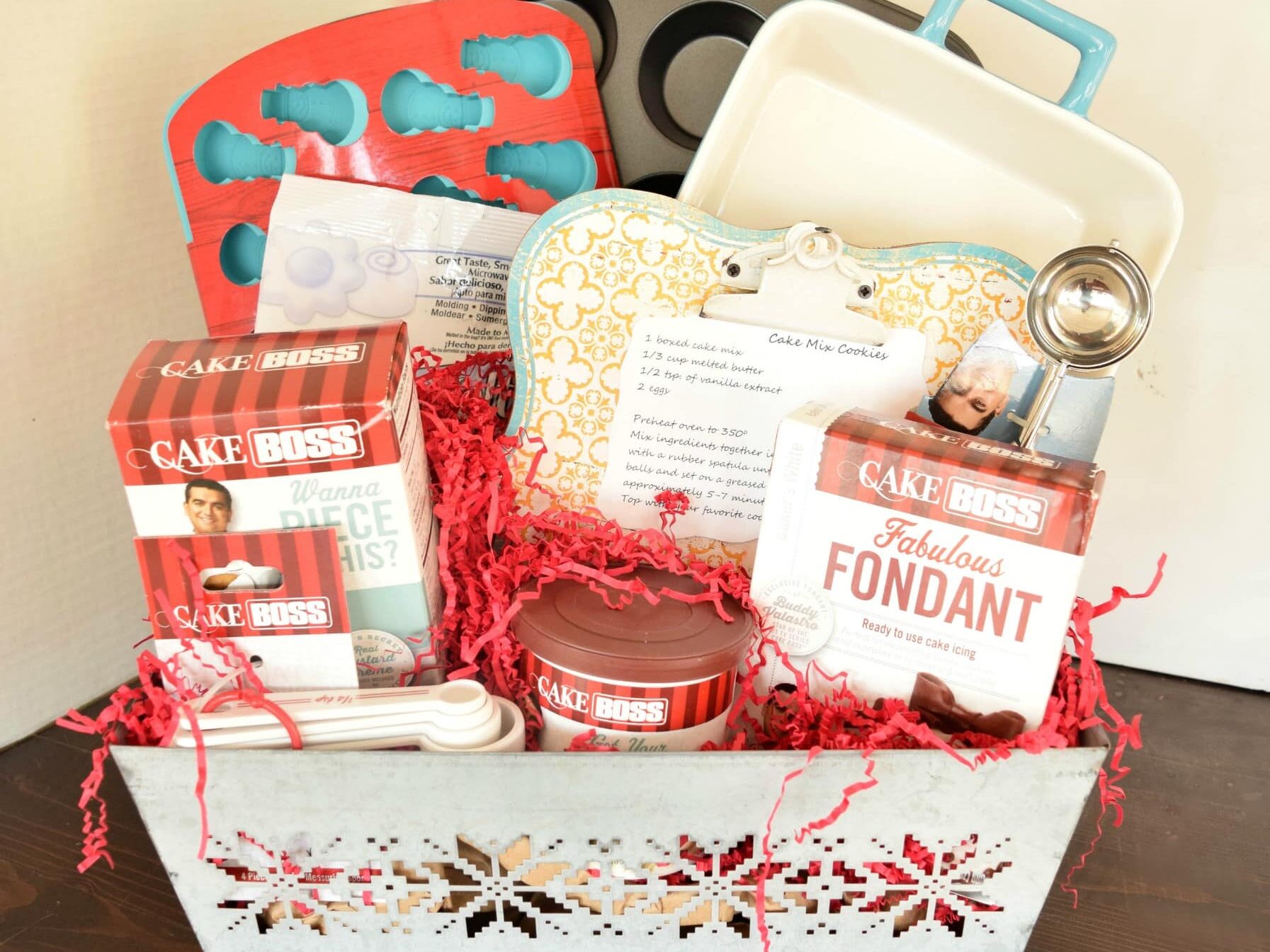 Baker's Christmas gift basket with pans and supplies. | The Dating Divas