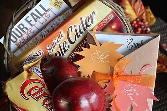A fall-themed basket filled with Halloween gifts | The Dating Divas