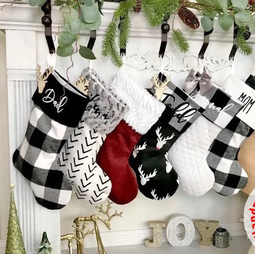 These buffalo plaid custom Christmas stockings will look lovely on your mantel. | The Dating Divas