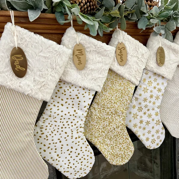 These gold classic personalized Christmas stockings will bring some sparkle to your holidays! | The Dating Divas