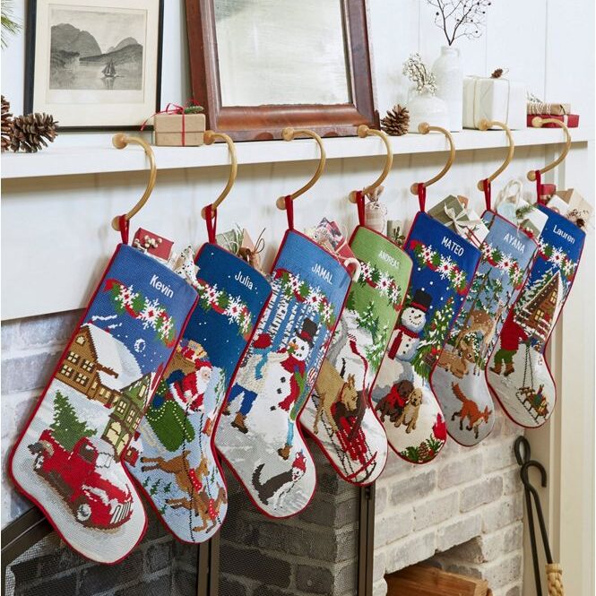 Give your mantel an old-fashioned look with these needlepoint personalized Christmas stockings. | The Dating Divas