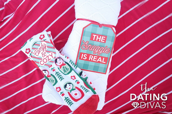 Attach fun printables to socks and sweaters for a cozy gift basket. | The Dating Divas