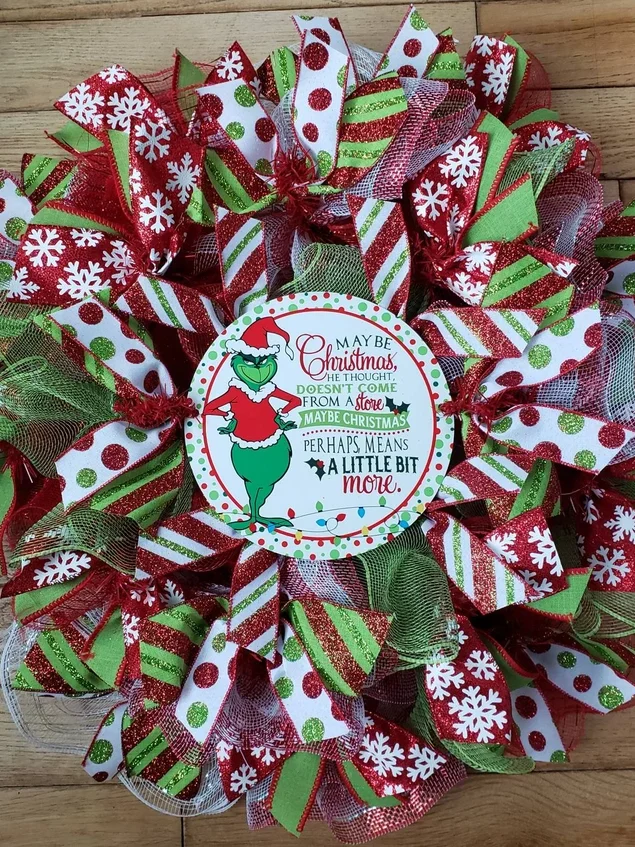 Everything you need is included in this Grinch Christmas wreath kit! | The Dating Divas 