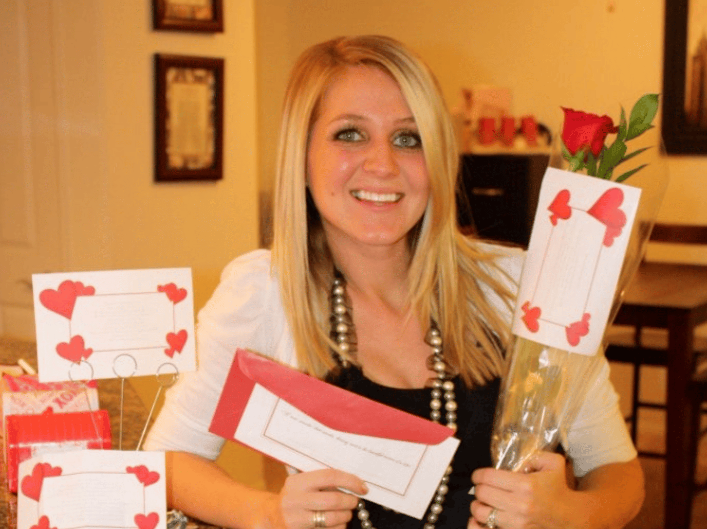 A red rose and a page explaining the rules for a rose scavenger hunt | The Dating Divas