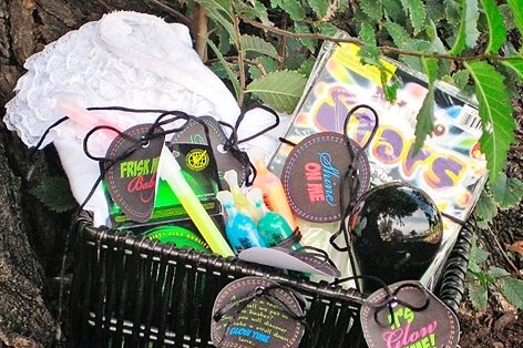 A basket filled with scavenger hunt ideas that glow in the dark | The Dating Divas