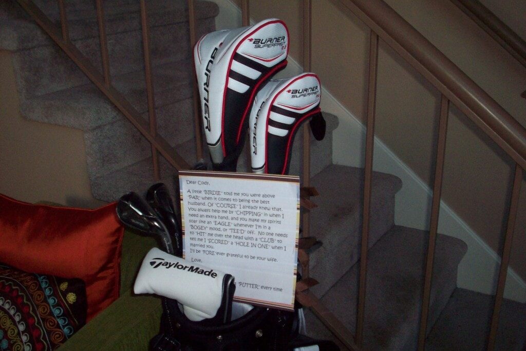 Golf clubs and a note explaining the rules for a golf scavenger hunt | The Dating Divas