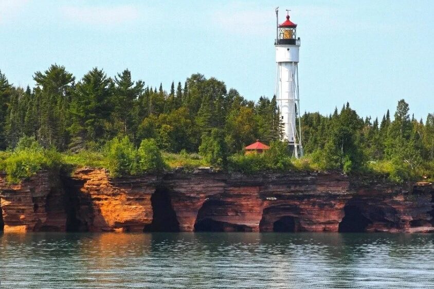 A picture of a lighthouse taken during a quick trip to Apostle Islands National Lakeshore | The Dating Divas