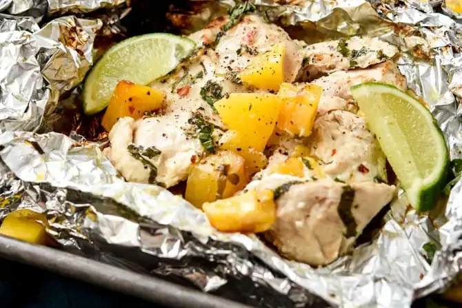 These mango mojito chicken foil packs are perfect for make-ahead camping meals! | The Dating Divas