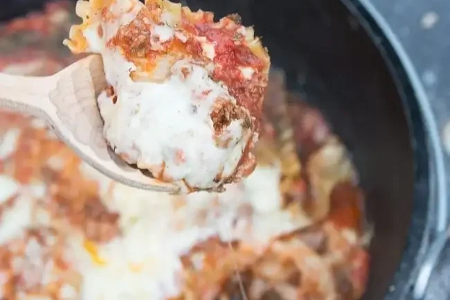 Do you want non-traditional camping recipes? Try this dutch oven lasagna! | The Dating Divas