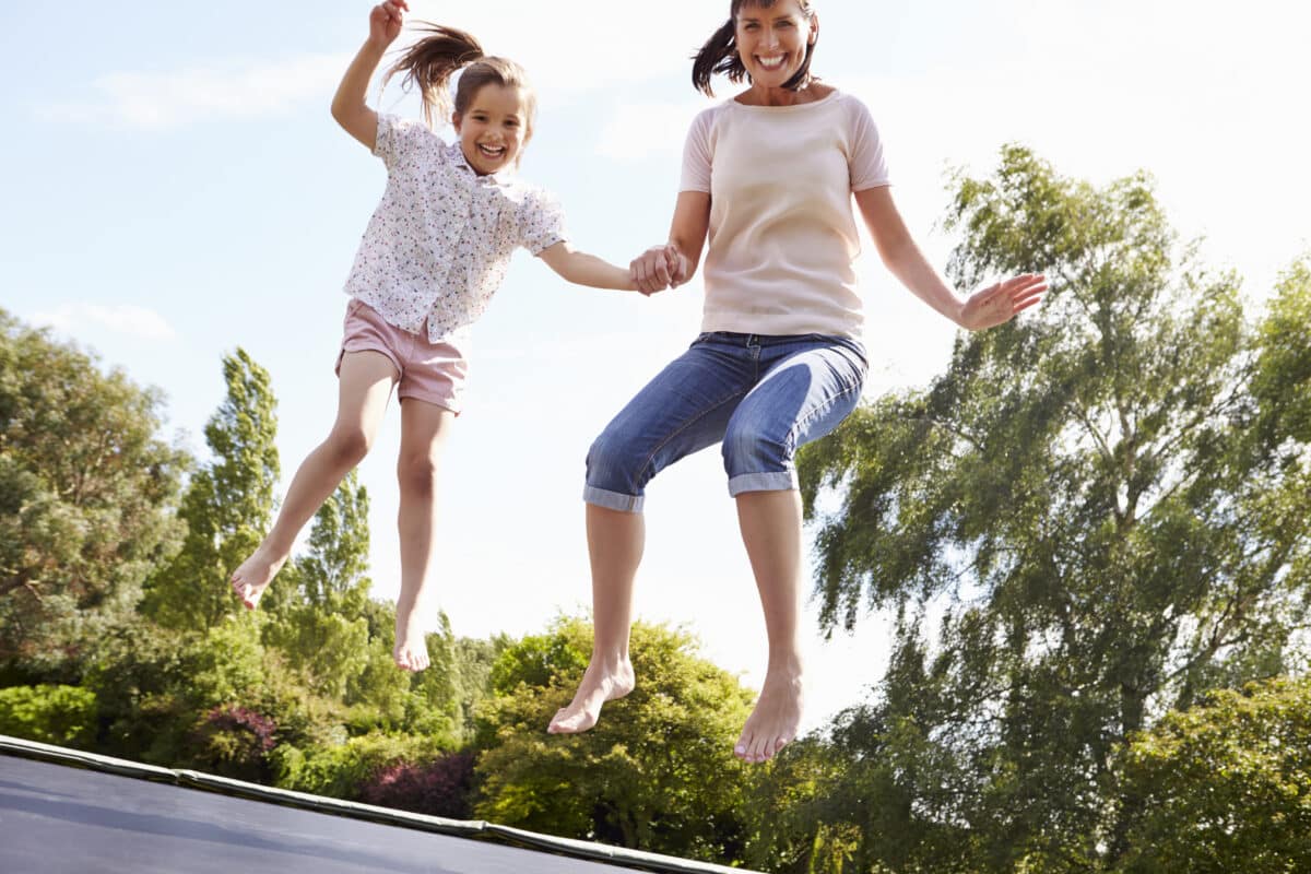 Want fun things to do outside with your family? Jump on the trampoline with your kids! | The Dating Divas