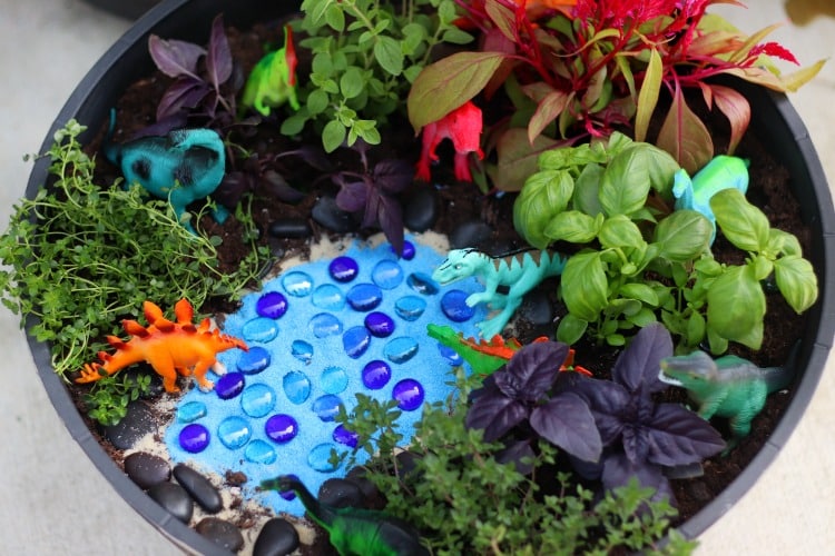 Looking for fairy garden ideas for kids? Try this dino-themed garden! | The Dating Divas