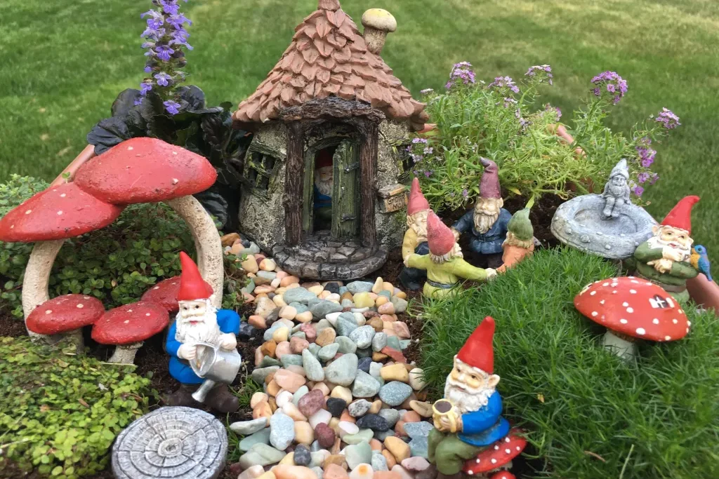 Make a fairy garden full of cute little gnome friends! | The Dating Divas