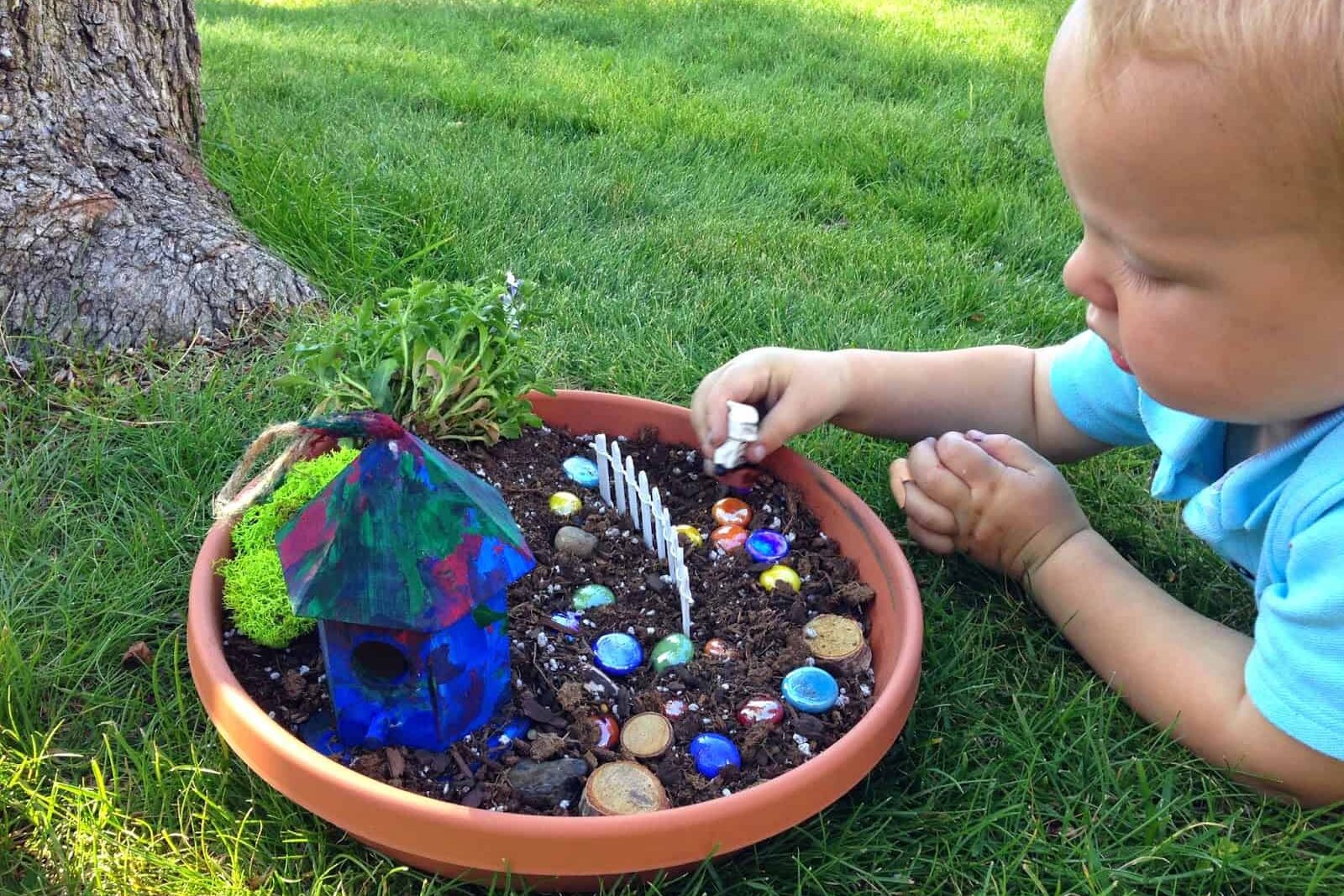 Let your kids play with Lego Minifigures in this playful fairy garden. | The Dating Divas