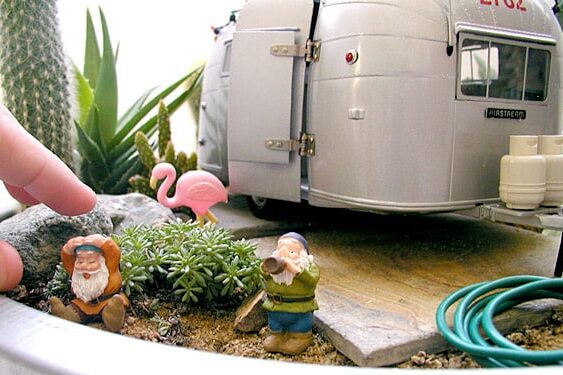 Looking for unique fairy garden ideas? Add a trailer and some gnomes to your garden pot! | The Dating Divas