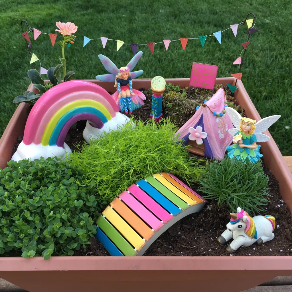 This colorful fairy garden will delight everyone! | The Dating Divas
