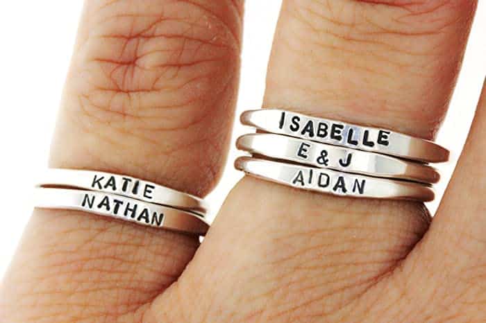 Engrave the names of all of Mom's children on stacking rings for perfect Mother's Day gift ideas. | The Dating Divas