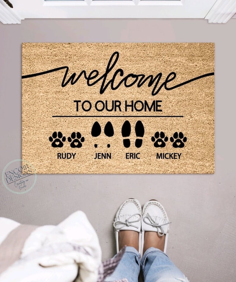 This adorable custom welcome mat is a congratulations gift they'll use for years! | The Dating Divas