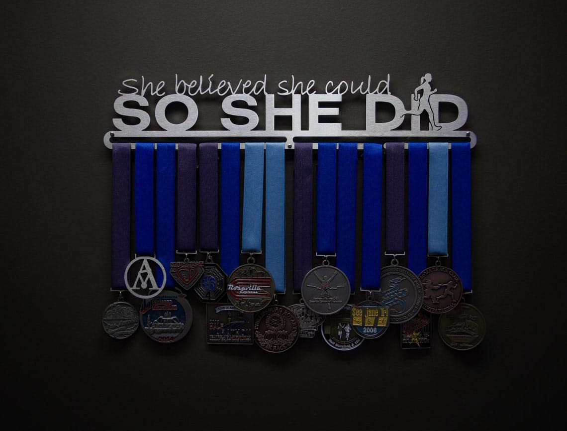 Help them stay motivated and celebrate their big wins with this epic medal holder as a congratulations gift. | The Dating Divas