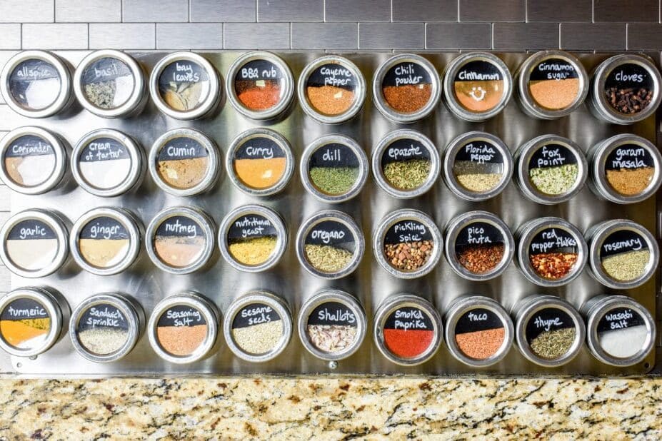 You can't go wrong with this fun DIY home decor project! Organize your spices with magnetic spice jars! | The Dating Divas