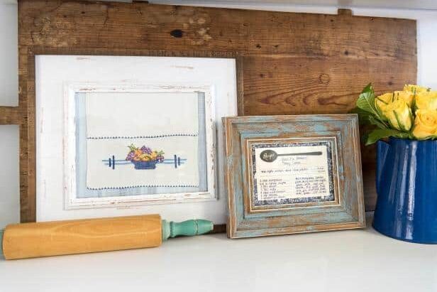 Use picture frames to turn your family heirlooms into beautiful DIY home decor. | The Dating Divas