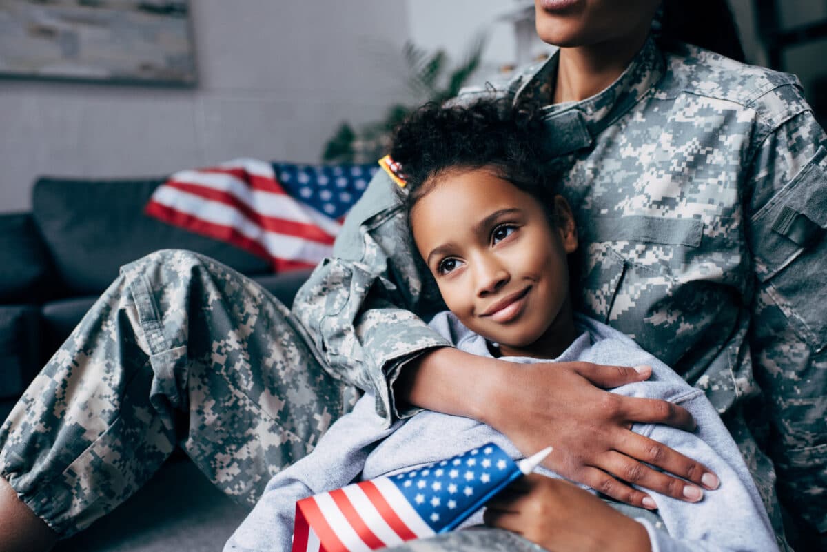 A daughter of a U.S. Military member sits with her mother and talks about patriotism and Independence Day quotes. | The Dating Divas