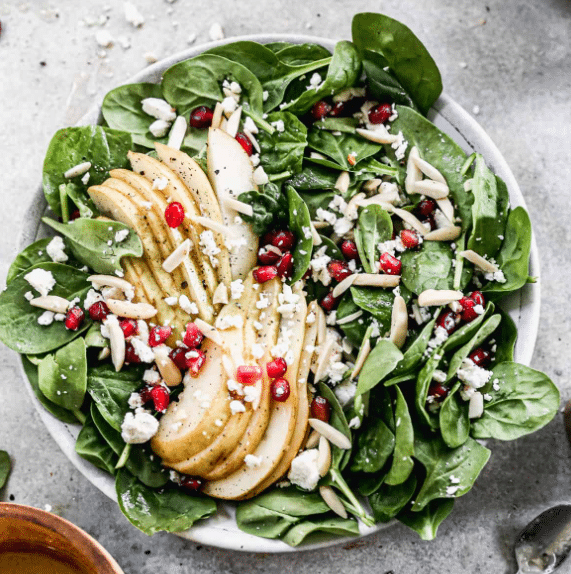 Your Thanksgiving dishes should include Pomegranate Pear Salad! | The Dating Divas 