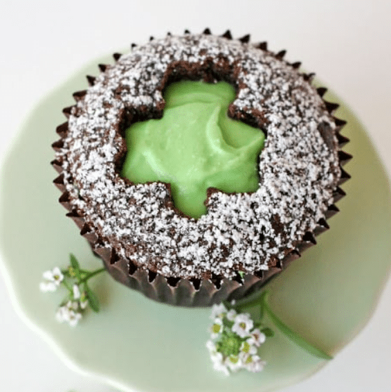 Shamrock cut-out cupcakes are definitely a St. Patrick's Day party food staple. | The Dating Divas 