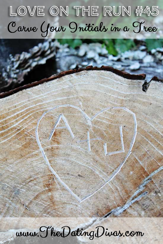 carved initials in a tree